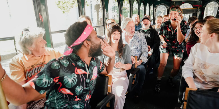 Savannah for Morons hosts and guests aboard trolley